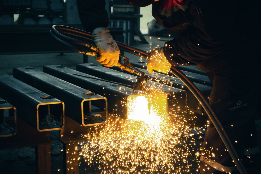 Noble Steel Corporation team working with MS structural beams