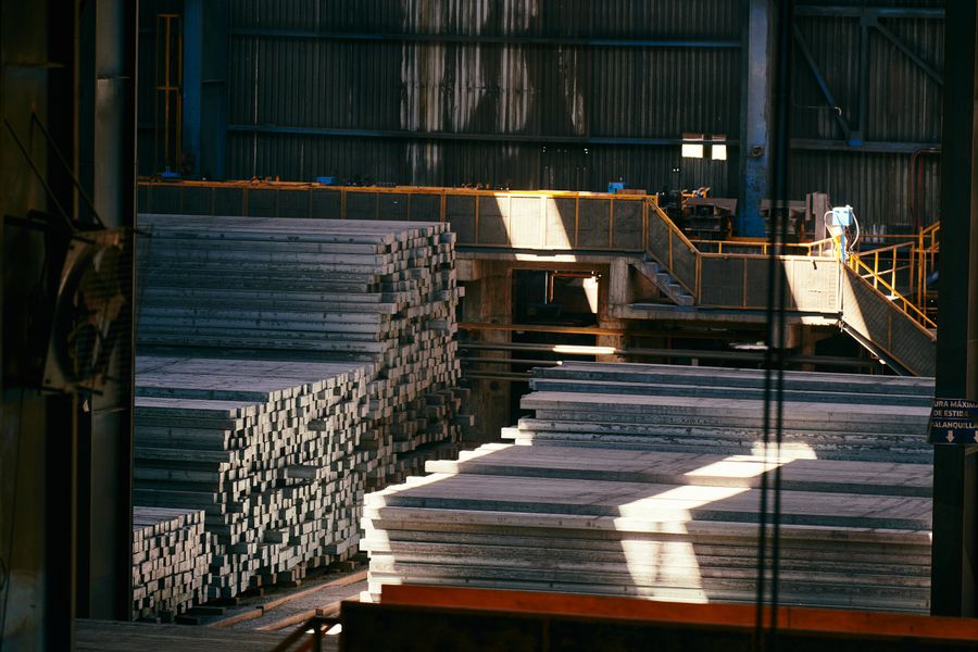 Steel plate being precision cut in a factory